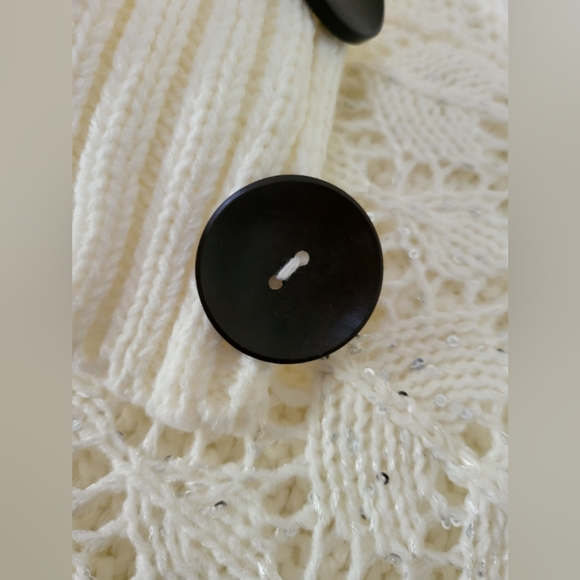 EUC! Ivory Knit Poncho with Silver sequin detail. Fits up to Size L. - Picture 4 of 5